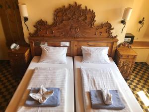 Postel nebo postele na pokoji v ubytování Family Hotel Schloss Rosenegg
