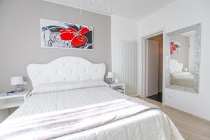 Cama ou camas em um quarto em Bellariva Monopoli B&B e Relax
