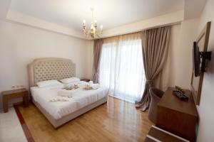 Posteľ alebo postele v izbe v ubytovaní Corali Resort + 37 fotografií