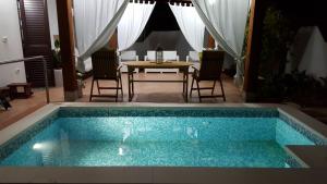 The swimming pool at or close to Sole D'oro IUN S4354