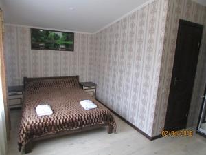 Postel nebo postele na pokoji v ubytování Salus + 10 fotografií