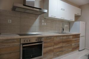 Mehmet Ali Luxury Apartment tesisinde mutfak veya mini mutfak