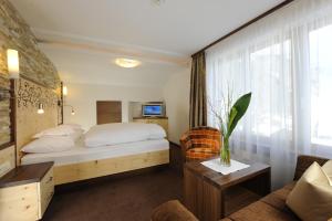 Postel nebo postele na pokoji v ubytování Hotel Jägerhof