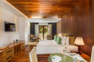 TV a/nebo společenská místnost v ubytování Nita by Vo Luxury Hotel