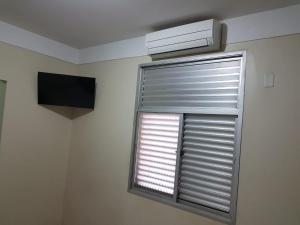 Un televizor și/sau centru de divertisment la Scala Hotel Barretos