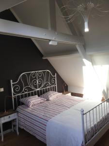 Letto o letti in una camera di Huyze Peerdenbrugghe