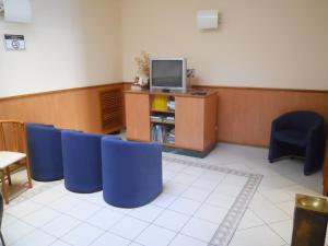 TV a/nebo společenská místnost v ubytování Albergo Italia