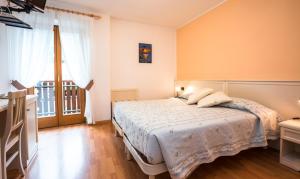 Voodi või voodid majutusasutuse Albergo Maggiorina toas