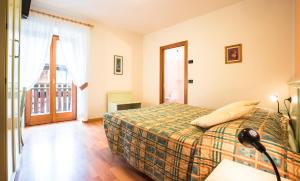 Voodi või voodid majutusasutuse Albergo Maggiorina toas
