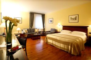 Voodi või voodid majutusasutuse Starhotels Excelsior toas