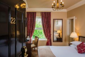 Uma cama ou camas num quarto em Gabriel House Guesthouse