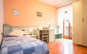 Voodi või voodid majutusasutuse Albergo Maggiorina toas