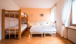 Voodi või voodid majutusasutuse Albergo Maggiorina toas