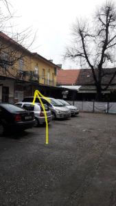 a group of cars parked in a parking lot at Home Away From Home - Apartment Ilica in Zagreb