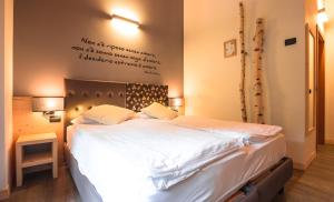 Voodi või voodid majutusasutuse Albergo Maggiorina toas