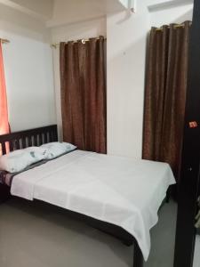 Posteľ alebo postele v izbe v ubytovaní Vimelzu Mhavic guest room