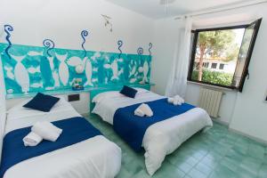 Кровать или кровати в номере Hotel Punto Verde