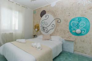 Кровать или кровати в номере Hotel Punto Verde