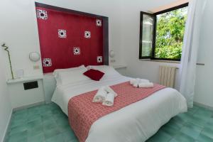 Кровать или кровати в номере Hotel Punto Verde