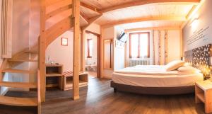 Voodi või voodid majutusasutuse Albergo Maggiorina toas