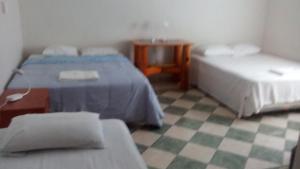 Postel nebo postele na pokoji v ubytování Yucatan Vista Inn Guest House