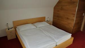 Ένα ή περισσότερα κρεβάτια σε δωμάτιο στο Apartment Köll