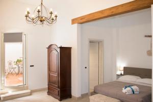Posteľ alebo postele v izbe v ubytovaní Residenze dello Scirocco