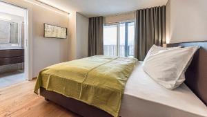Postel nebo postele na pokoji v ubytování Penthouse Skygarden