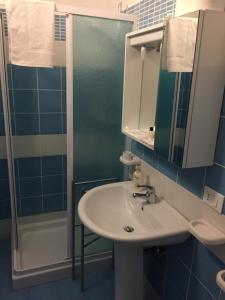 a bathroom with a sink and a shower at Etna Vintage in Linguaglossa +109 photos