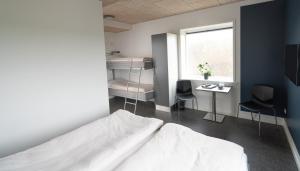 Postel nebo postele na pokoji v ubytování ICV SleepWell