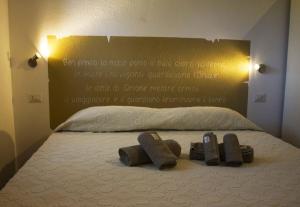 Letto o letti in una camera di La Casa Del Poeta
