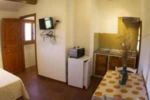 Cucina o angolo cottura di La Casa Del Poeta