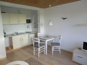 Kuchyň nebo kuchyňský kout v ubytování Haus Strandgut/2 + 2 fotografie