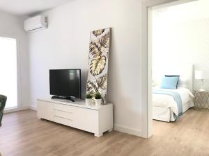 Et tv og/eller underholdning på Apartamento Seaview