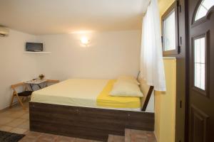 Postel nebo postele na pokoji v ubytování Room Dioklecijan