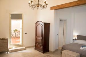 Posteľ alebo postele v izbe v ubytovaní Residenze dello Scirocco