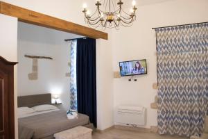 Posteľ alebo postele v izbe v ubytovaní Residenze dello Scirocco