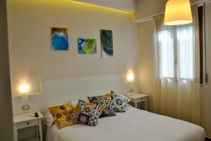 Кровать или кровати в номере Hotel Villa Fiorita