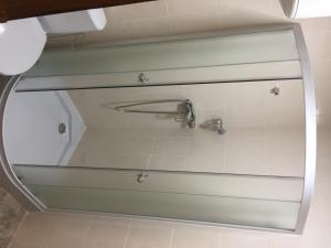 a bathroom with a sink and a mirror at Эко отель "Золотая подкова" in Sharhorod