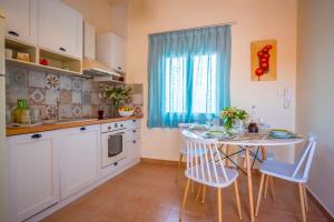 Kuchyňa alebo kuchynka v ubytovaní Maribella Residence Old Town Rethymno + 10 fotografií