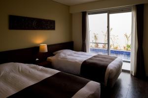 Ένα ή περισσότερα κρεβάτια σε δωμάτιο στο Coldio Pool & Villas Sumuide