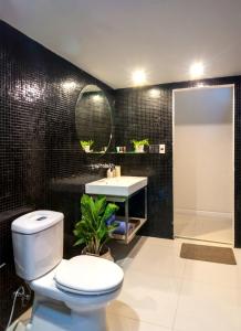 a bathroom with a toilet and a sink at AYA Homestay in Ho Chi Minh City