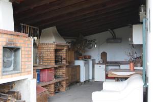 Η κουζίνα ή μικρή κουζίνα στο Quinta de S. Luis - Valada +18 φωτογραφίες