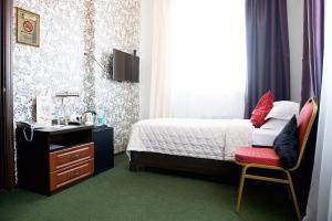 Кровать или кровати в номере Бутик-отель Молли О'Брайн