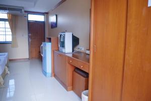 Kuchyň nebo kuchyňský kout v ubytování Baan JPN Hotel