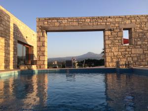 The swimming pool at or close to Villa Ypsilon