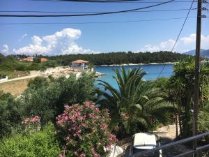 a view of a lake from a balcony at Kiki Studios in Fiskardo