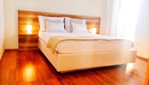 Postel nebo postele na pokoji v ubytování Apartments Kovacic