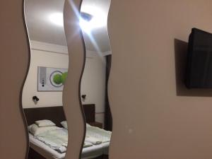 Postel nebo postele na pokoji v ubytování Thermal Garden Weninger Apartmanok