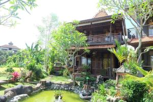 Zahrada ubytování Ganesha Ubud Inn + 25 fotografií